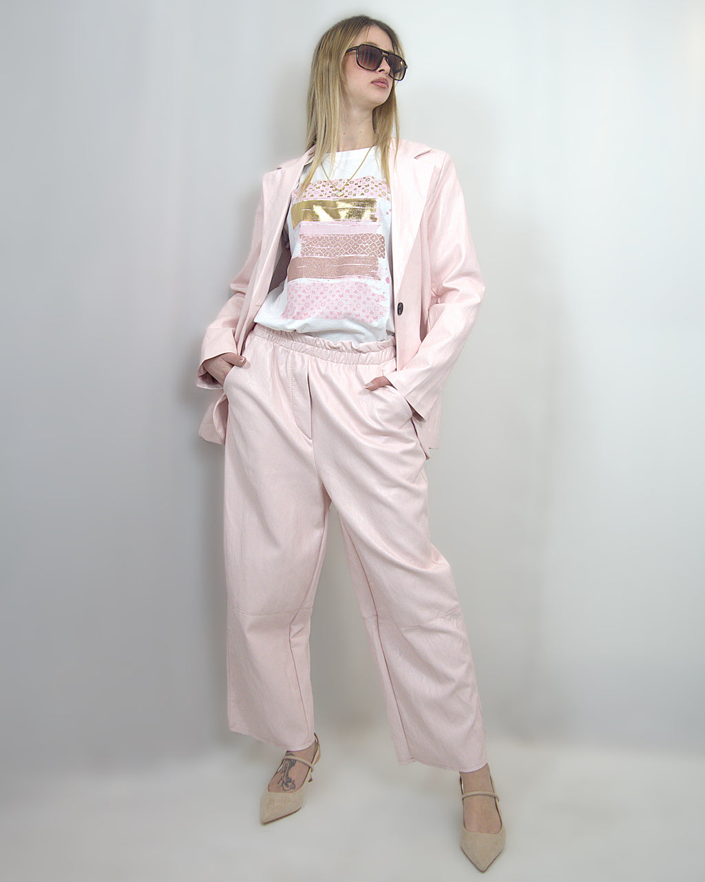 pantaloni in ecopelle rosa