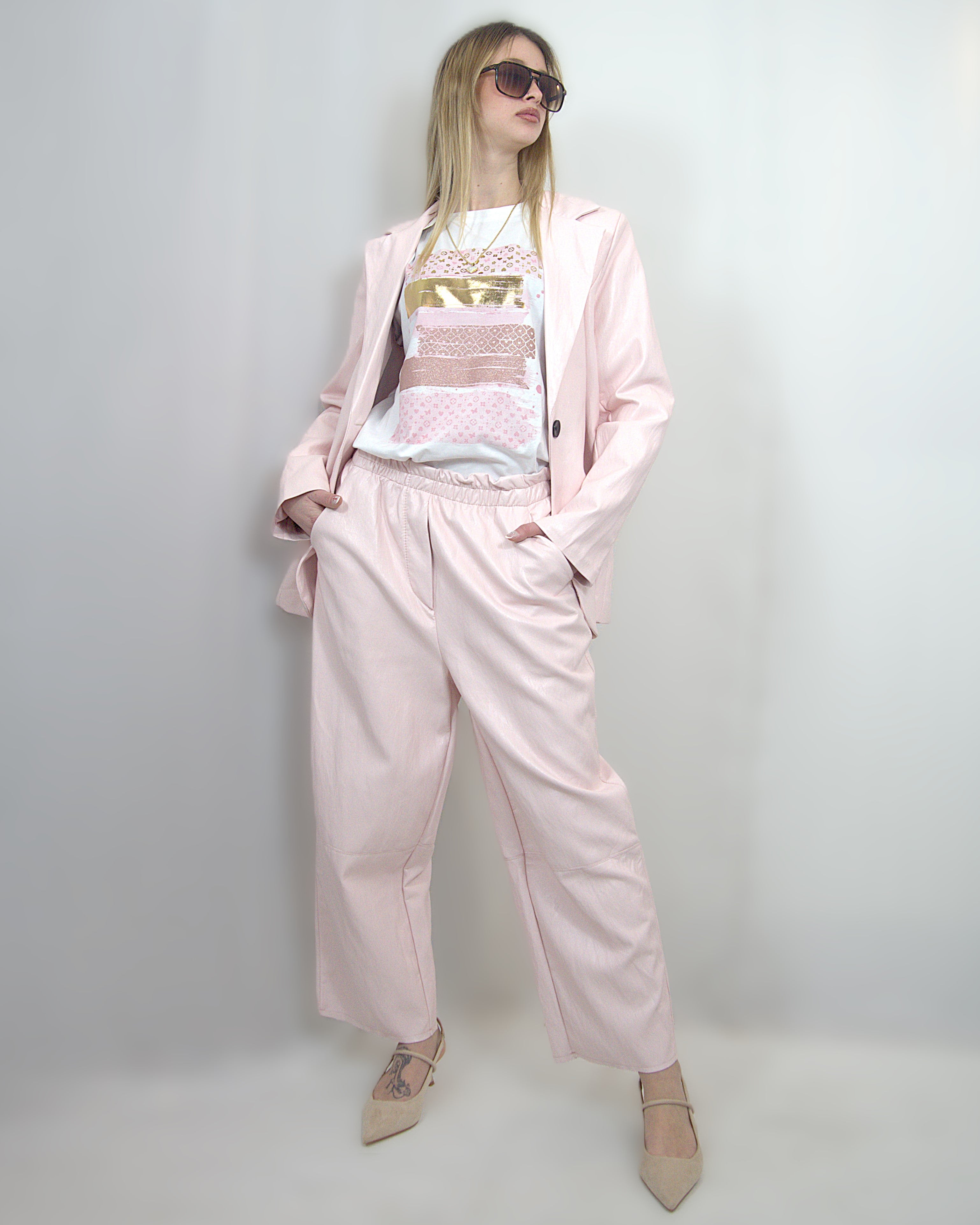 pantaloni in ecopelle rosa